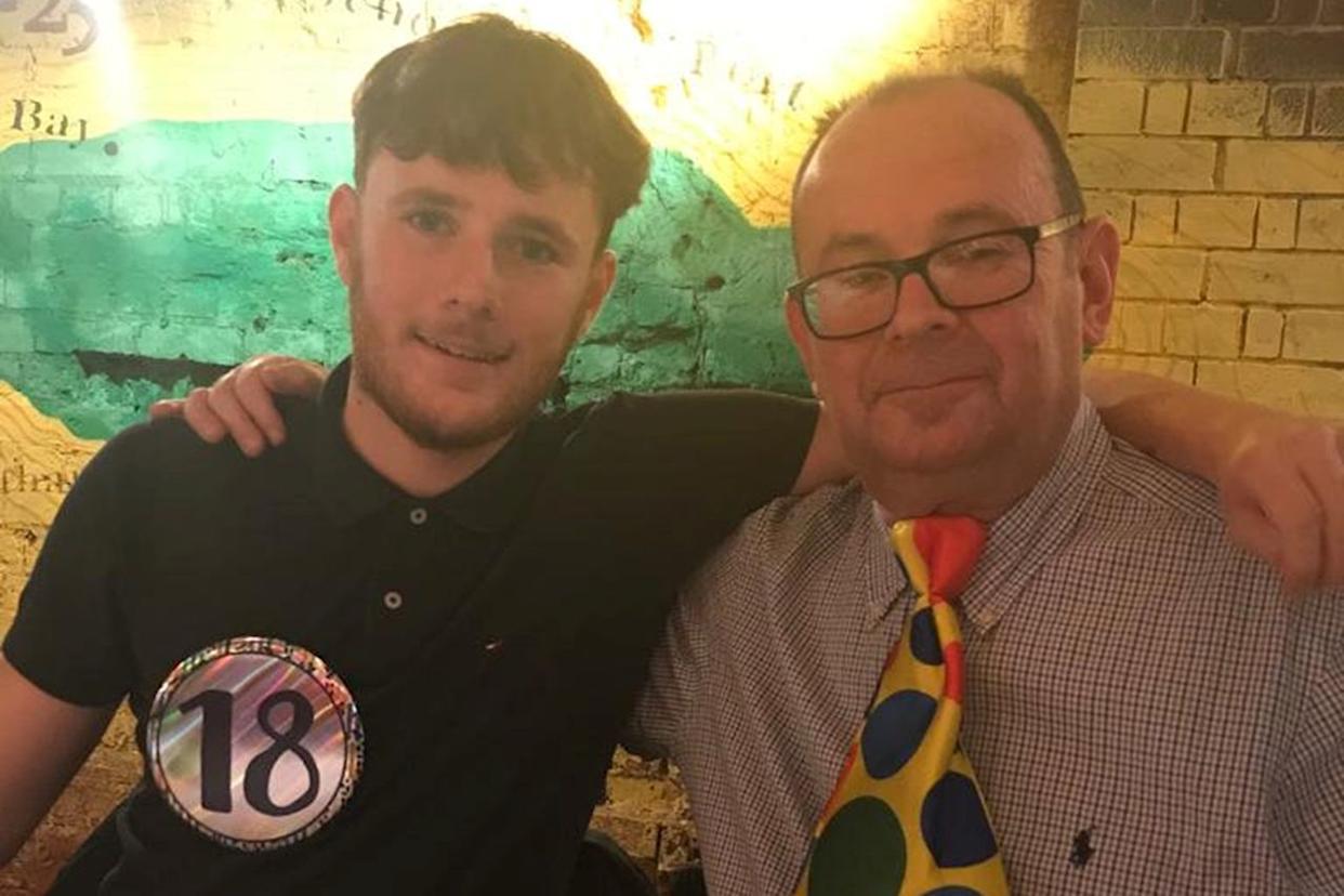 Richard Abrahams / SWNS Luke Abrahams with his dad Richard