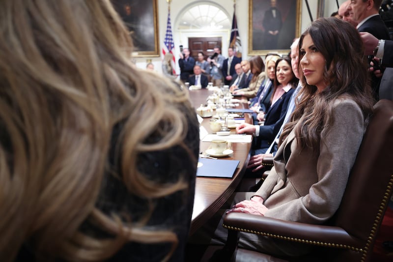 President Donald Trump noticeably did not call on or acknowledge Homeland Security Secretary Kristi Noem, pictured looking on silently as others spoke, during a Cabinet meeting at the White House on January 29, 2026.