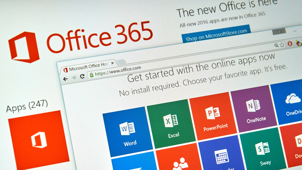 Splash screen of a Microsoft Office 365 load screen with the Office.com website loaded in the foreground.