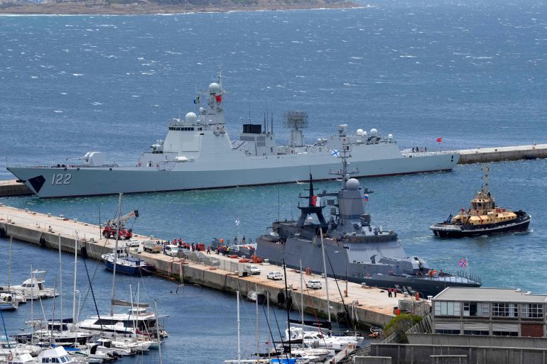 The Chinese guided-missile destroyer Tangshan, left, and the Russian corvette Stoikiy, right, in the Simon's Town harbour, in Cape Town, South Africa, Friday, Jan. 9, 2026. (AP Photo/Nardus Engelbrecht)