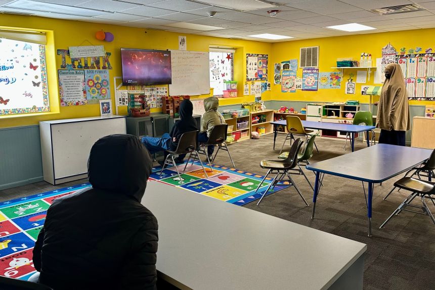 Children watch television at ABC Learning Center in Minneapolis on December 31.
