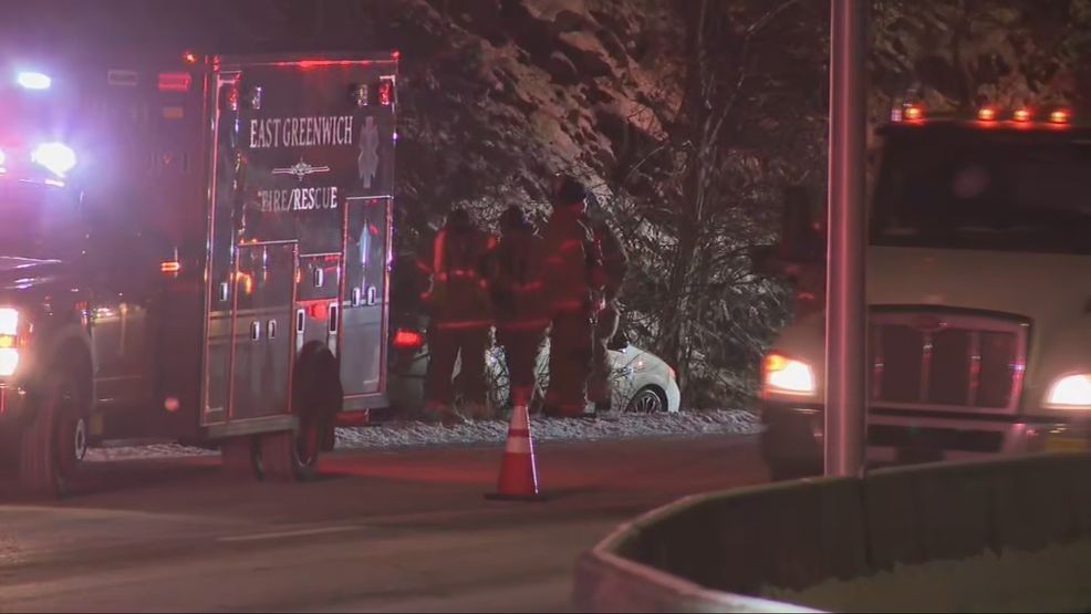 Crews responded to a vehicle in a wooded area off Route 4 in East Greenwich. (WJAR) 