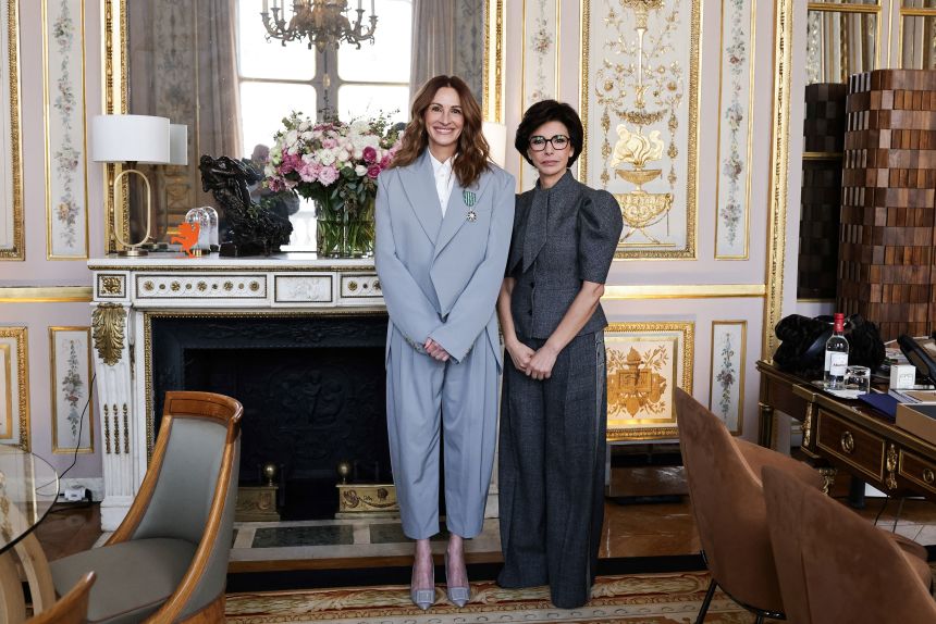 Roberts with France's Minister of Culture Rachida Dati, after receiving the 