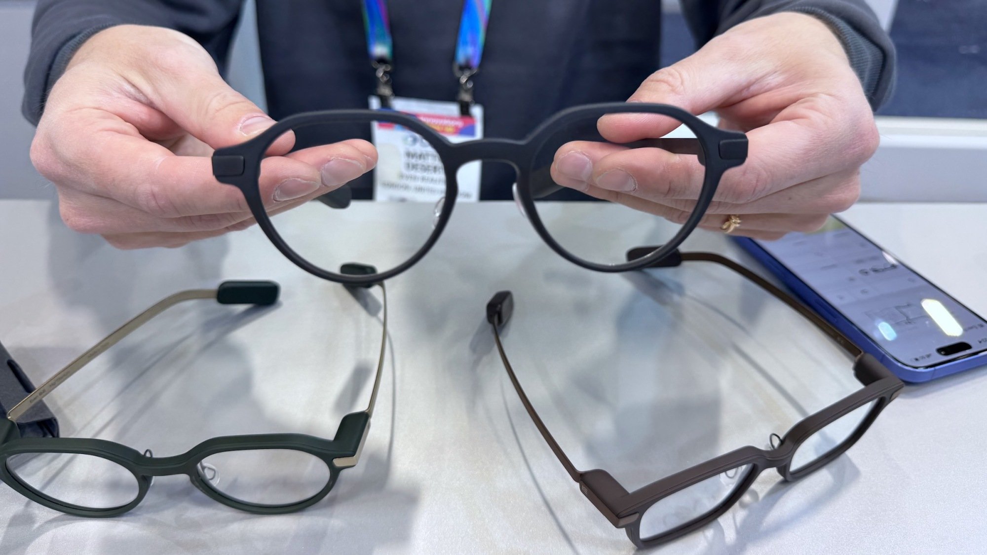 three pairs of even realities even g2 smart glasses on display