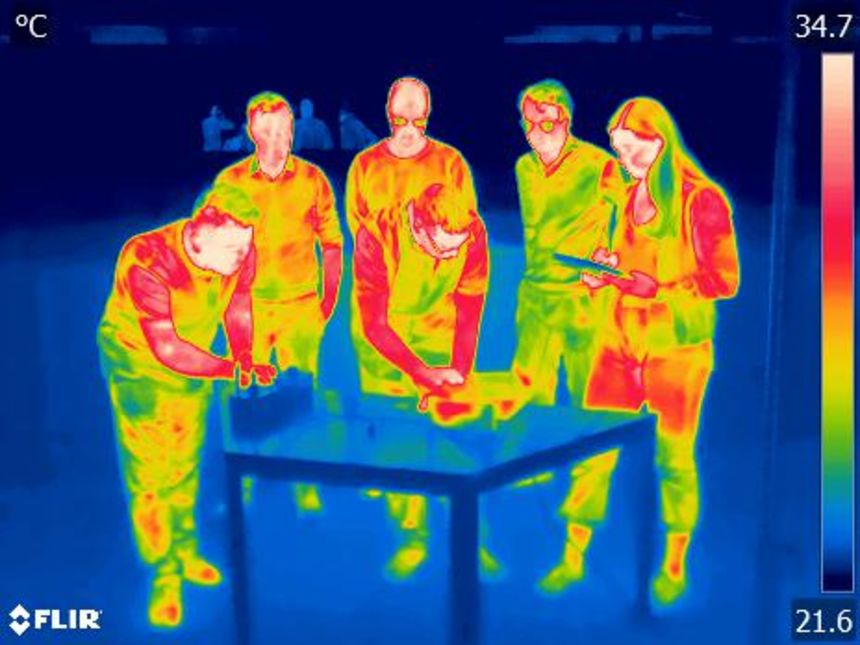 An infrared image shows the heat radiated from the bodies of scientists at the University of New South Wales.