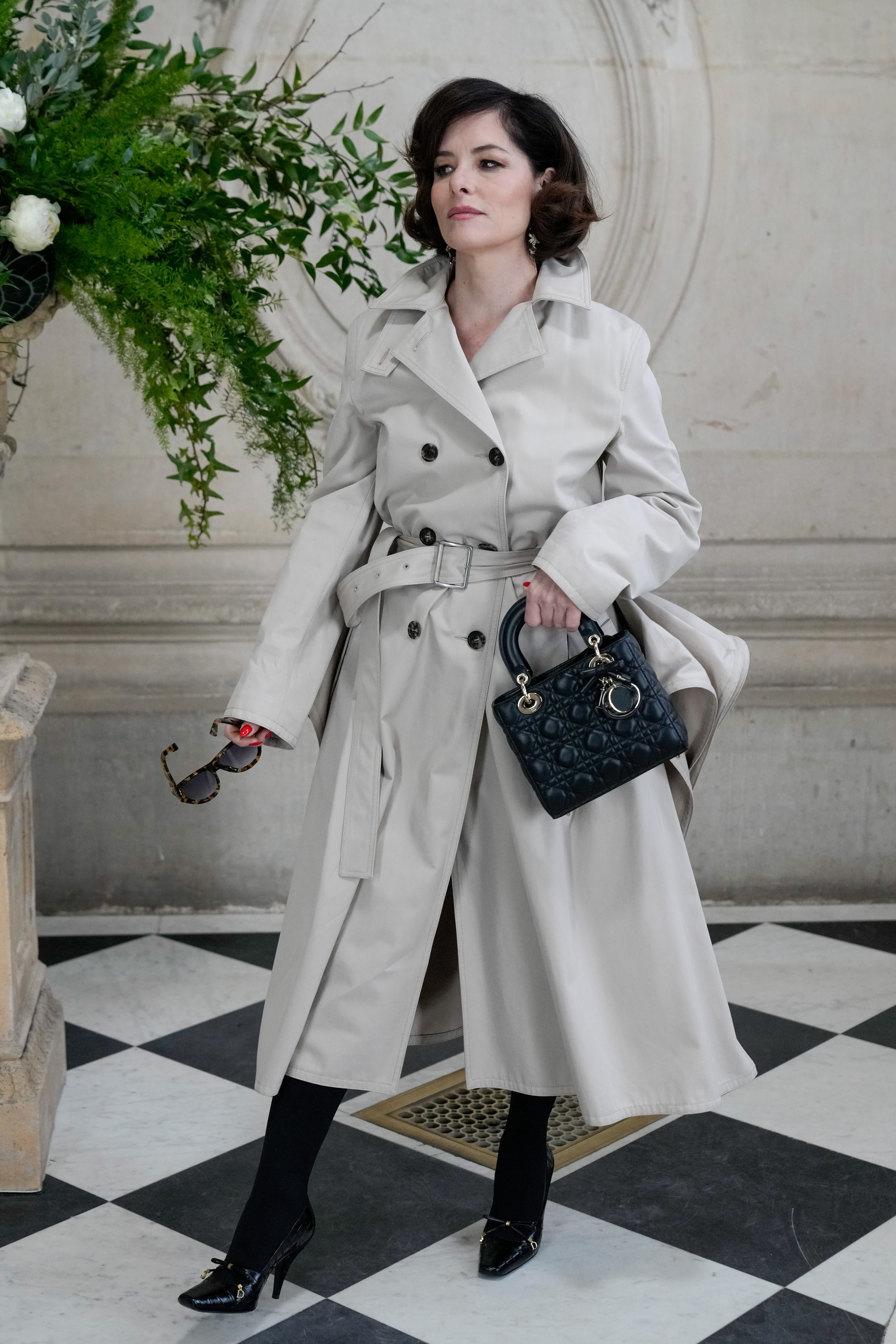 Parker Posey attends the Christian Dior Haute Couture show during Paris Fashion Week.