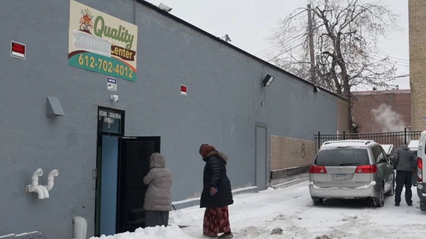 People enter Quality Learning Center in Minneapolis on December 30.