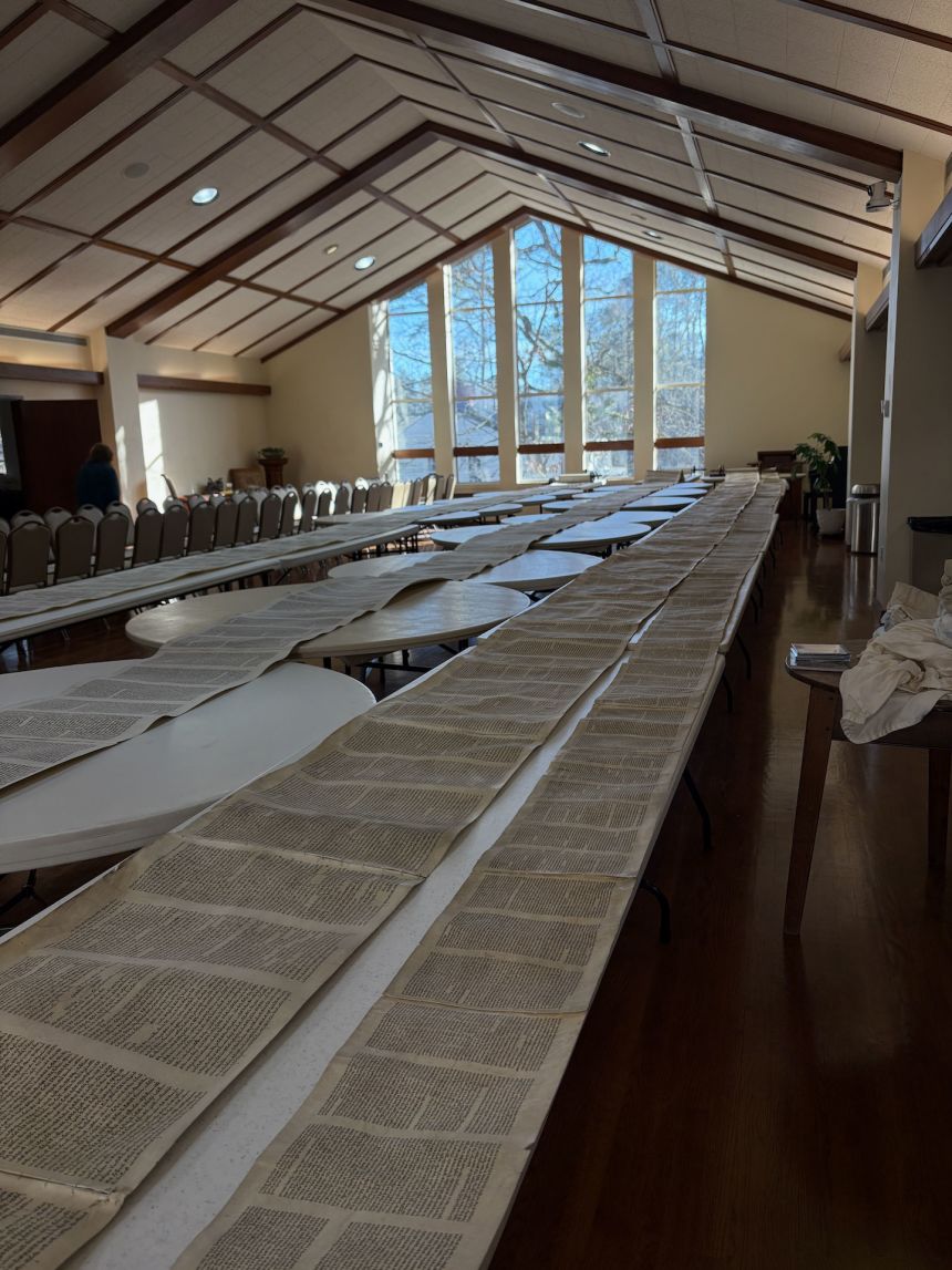 Torah scroll pages from Beth Israel Congregation dry out after the fire.