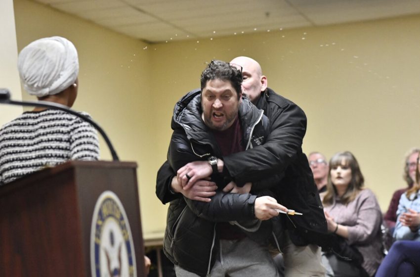  Rep. Ilhan Omar rushed on stage and sprayed with liquid at town hall event : NPR