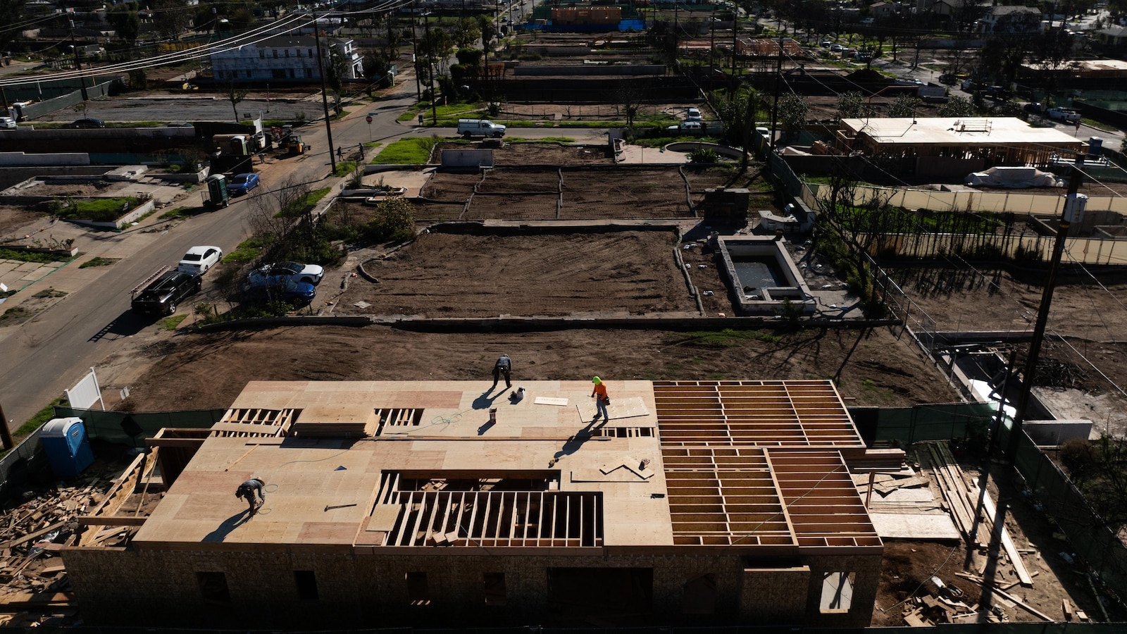  A year after LA wildfires destroyed thousands of homes, fewer than a dozen rebuilt