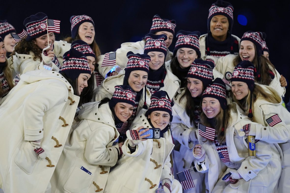 US athletes take a selfie during the opening ceremony at the San Siro stadium in Milan.