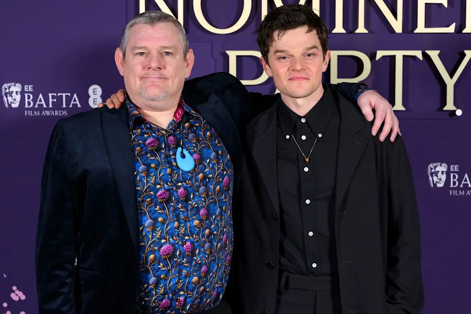 John Davidson and actor Robert Aramayo at the 2026 BAFTAs in London on Feb. 22 Karwai Tang/WireImage