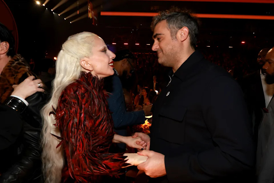 Lady Gaga shares a moment with fiancé Michael Polansky at the Grammys.