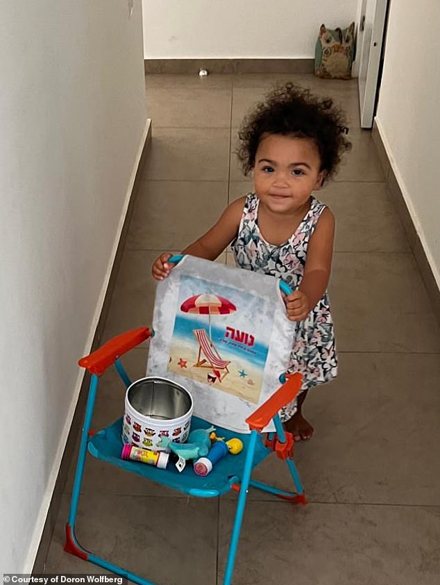 He explained that for the first 18 months Talia, seen here before her diagnosis, developed perfectly normal; she learned to walk and talk and hit all of her milestones