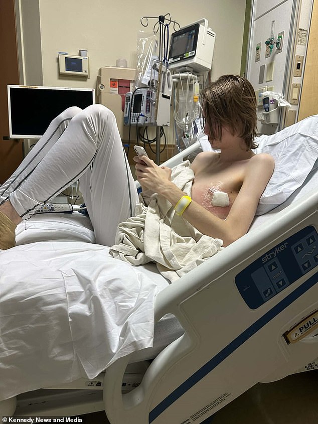 Dodge is pictured above in the hospital. He still has intense pain and tells his mother he is afraid of another lung collapse