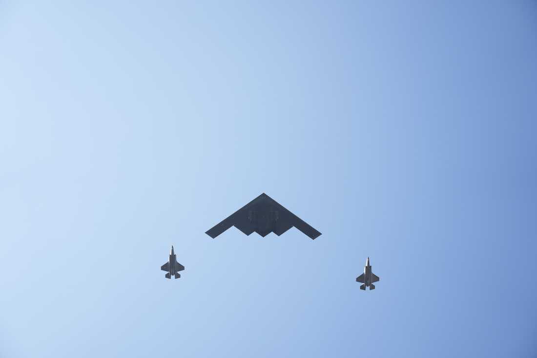 A nuclear-capable B-2 Spirit bomber flies over the White House on July 4, 2025 in Washington, DC. Nuclear arms control experts don't believe the expiration of the New START treaty will immediately lead to a new arms race, though that dynamic could change over time.