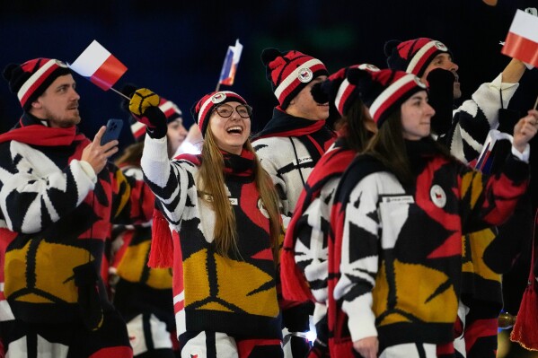 Czechia arrives during the Olympic opening ceremony at the 2026 Winter Olympics, in Milan, Italy, Friday, Feb. 6, 2026. (AP Photo/Ashley Landis)