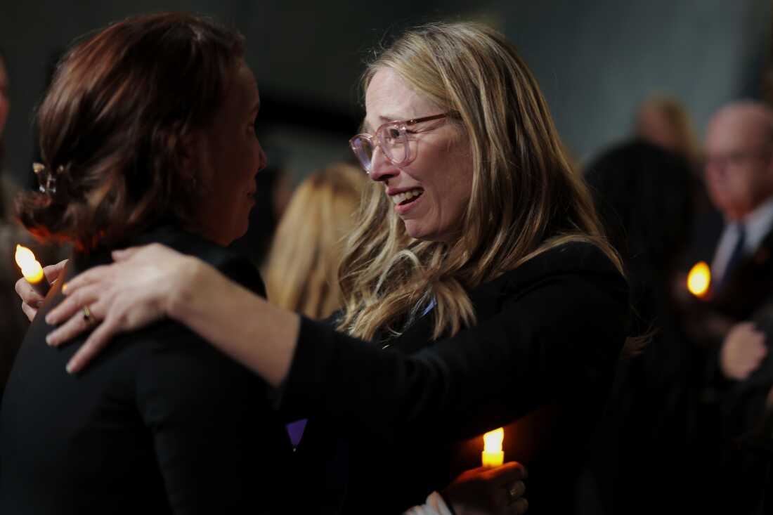 Epstein abuse survivors Jena-Lisa Jones and Annie Farmer (right) hug after receiving word that the Senate unanimously approved passage of the House's Epstein Files Transparency Act on Capitol Hill on November 18, 2025 in Washington, DC. Farmer expressed concern about unredacted names of Epstein accusers in the Department of Justice's release of the files.