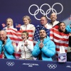 Alysa Liu celebrates with other Team USA figure skaters after her performance in the team event on Friday.