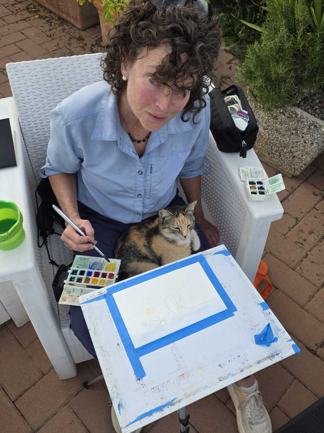 Betsy Benoit is pictured working on a painting project.