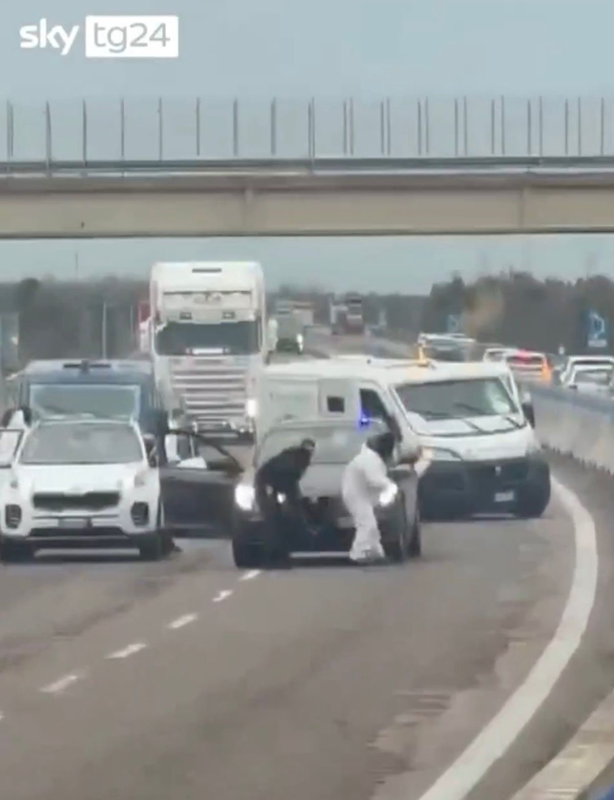 Horrified drivers looked on as the violent scenes unfolded on a motorway