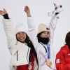 Chloe Kim (L), Gaon Choi (C) and Mitsuki Ono celebrate with their medals after the women's snowboard halfpipe event in Livigno, Italy on Thursday.