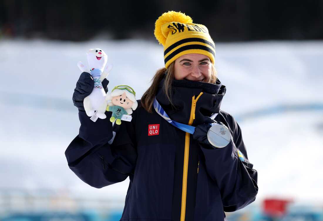 Silver medalist Ebba Andersson of Team Sweden celebrates on the podium during the Medal Ceremony for the Women's 10km + 10km Skiathlon on day one of the Milano Cortina 2026 Winter Olympic games at Tesero Cross-Country Skiing Stadium on Feb. 7 in Val di Fiemme, Italy.
