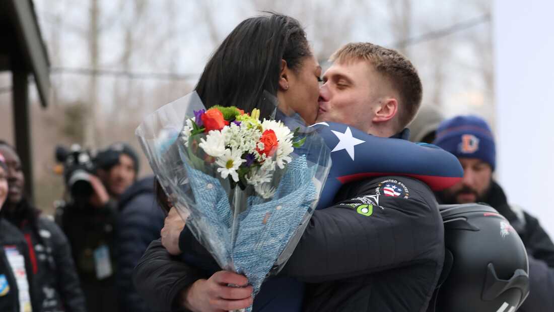 Bobsledders Kaysha Love and Hunter Powell celebrate after Love won a race in Lake Placid, N.Y., in March 2025. The couple is now engaged.