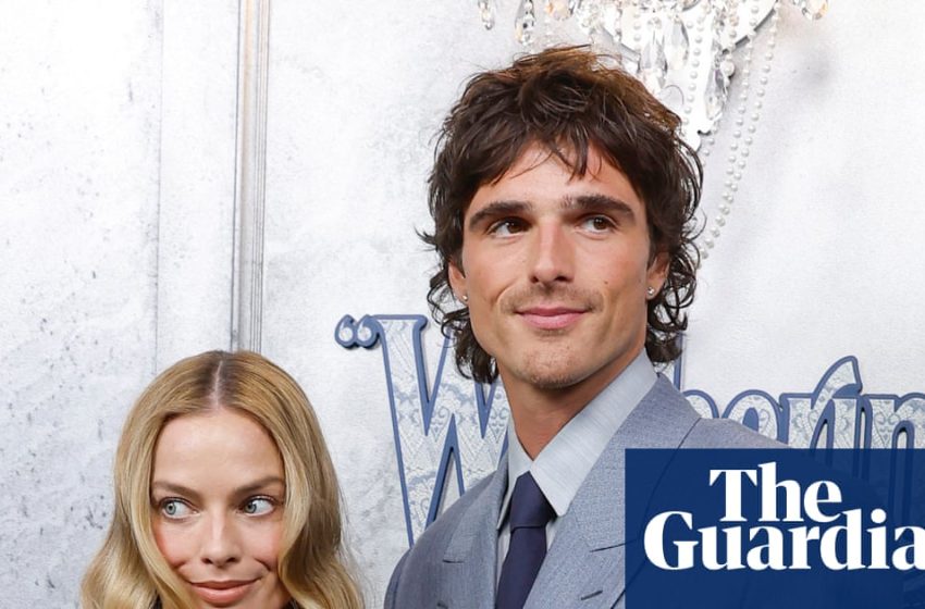  Feathers, lace and Jacob Elordi’s gold tooth: Wuthering Heights premieres in Australia – in pictures – The Guardian