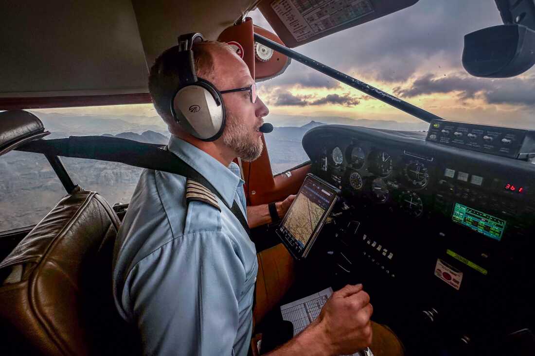 MAF pilot Joe Adams flies a team from the Lesotho Flying Doctor Services over mountainous terrain in the highlands of Lesotho. Adams, originally from Washington State, has been working with the Lesotho Flying Doctor Services since 2019.