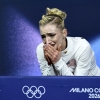 Amber Glenn reacts to her score in the women's short program event on Tuesday. She got docked for landing a double loop instead of a triple loop, despite an otherwise strong performance.