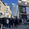 On a sunny Sunday morning smack-dab in the middle of the Winter Olympics, the line to enter Milan's Official Olympic Pin Trading center was out the door and steadily growing.