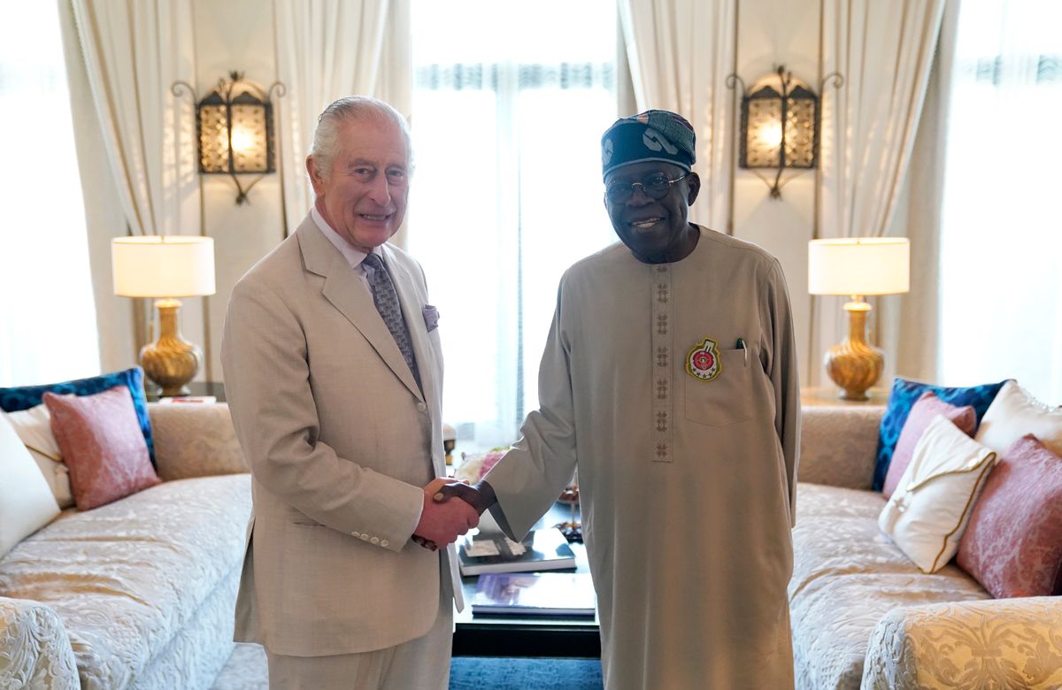 King Charles III shakes hands with Nigerian President Bola Ahmed Tinubu
