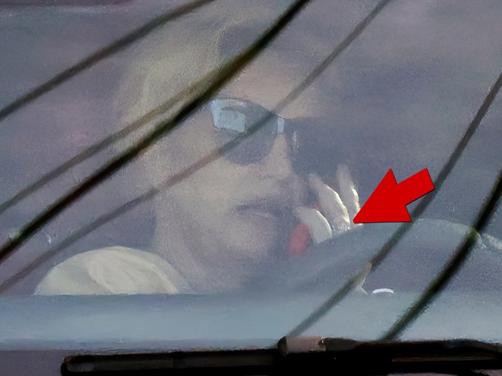britney spears driving with ring in hand backgrid 4