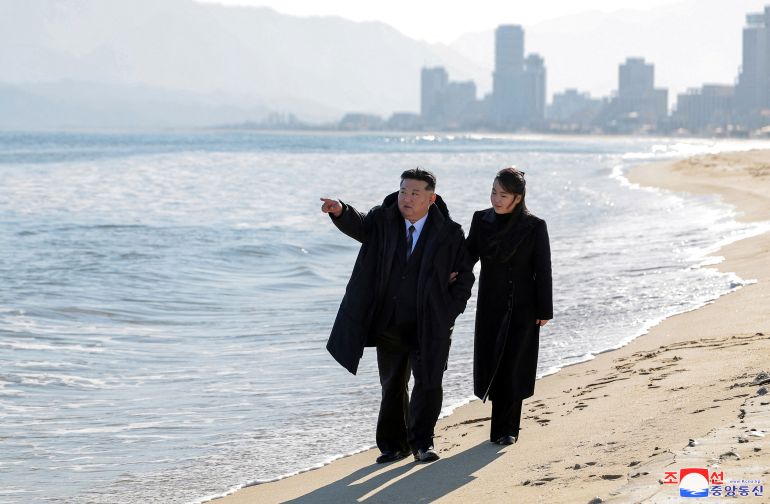 North Korean leader Kim Jong Un and his daughter Kim Ju Ae visit the newly built Kalma coastal tourist area in Wonsan, North Korea, December 29, 2024, in this photo released by North Korea's official Korean Central News Agency. KCNA via REUTERS ATTENTION EDITORS - THIS IMAGE WAS PROVIDED BY A THIRD PARTY. REUTERS IS UNABLE TO INDEPENDENTLY VERIFY THIS IMAGE. NO THIRD PARTY SALES. SOUTH KOREA OUT. NO COMMERCIAL OR EDITORIAL SALES IN SOUTH KOREA.