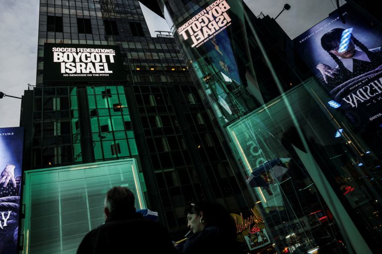 A billboard in Times Square displays the message "Soccer Federations: Boycott Israel" as part of the campaign by Game Over Israel calling for a boycott of Israel by national soccer federations over the war in Gaza, in New York City, U.S