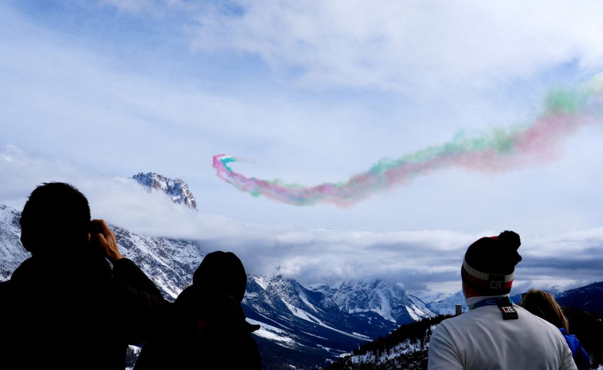 Frecce Tricolori, the aerobatic demonstration team of the Italian Air Force, performs over the Tofane Alpine Skiing Centre on February 12.