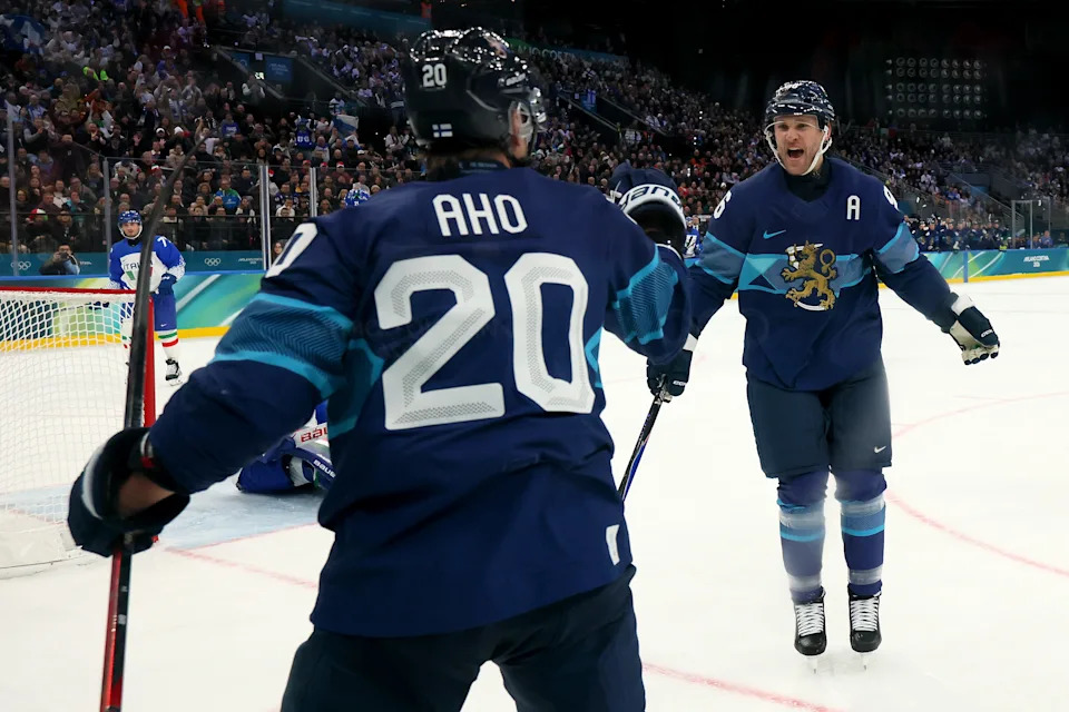 MILAN, ITALY - FEBRUARY 14: Sebastian Aho #20 of Team Finland celebrates after scoring a goal with Mikko Rantanen #96 in the first period during the Men's Preliminary Group B match between Finland and Italy on day eight of the Milano Cortina 2026 Winter Olympic games at Milano Santagiulia Ice Hockey Arena on February 14, 2026 in Milan, Italy. (Photo by Bruce Bennett/Getty Images)