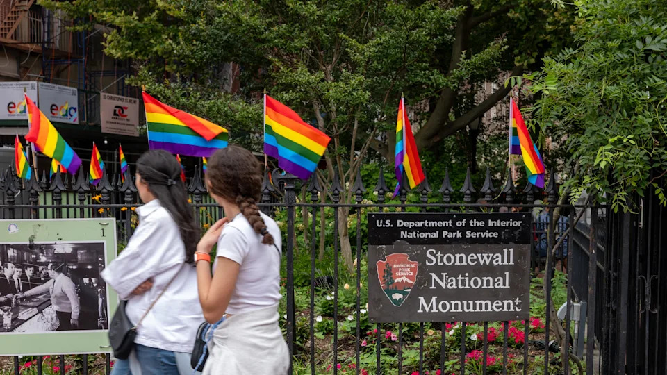 NEW YORK, NEW YORK - JUNE 26: People walk by the Stonewall Monument on June 26, 2025 in New York City. / Spencer Platt / Getty Images