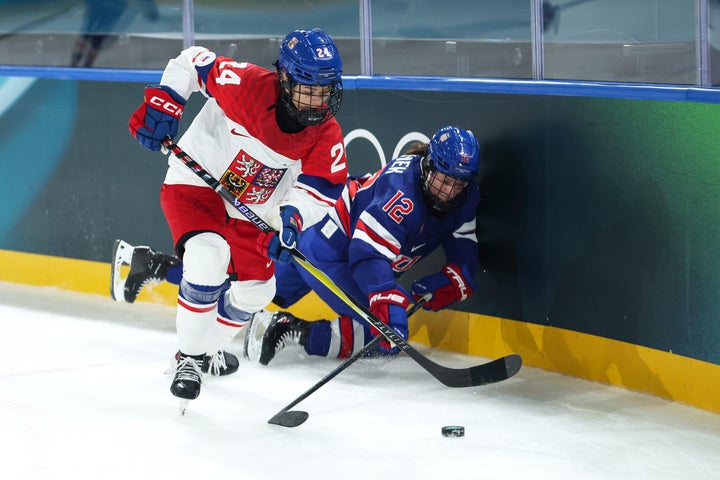 Kelly Pannek (#12) competes for the puck in the American's opening-round victory over Czechia.