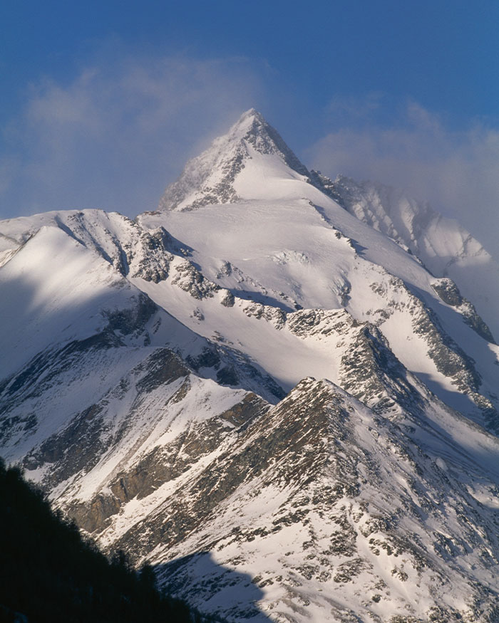 Snow-covered mountain peak with climber revealing girlfriend's heartbreaking last words before being left on mountain.