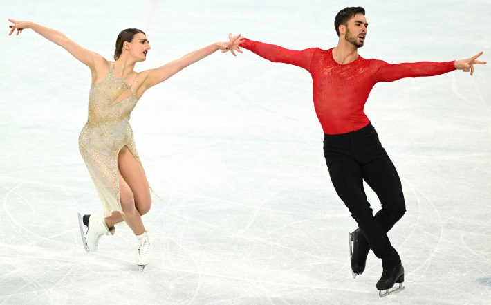 Gabriella Papadakis and Guillaume Cizeron compete in the ice dance free dance of the figure skating event during the Beijing 2022 Winter Olympic Games at the Capital Indoor Stadium in Beijing on February 14, 2022.