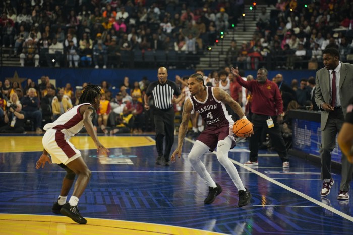 JerMontae Hill (right) of Morehouse College dribbles the ball during the NBA HBCU Classic on Feb. 15, 2025, in San Francisco. Tuskegee University defeated Morehouse 68-55. 