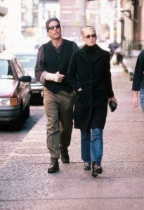 (Original Caption) : 10/18/1997-New York, NY: John F. Kennedy Jr. walks along a New York City street with wife Carolyn Bessette. (Photo by Mitchell Gerber/Corbis/VCG via Getty Images)
