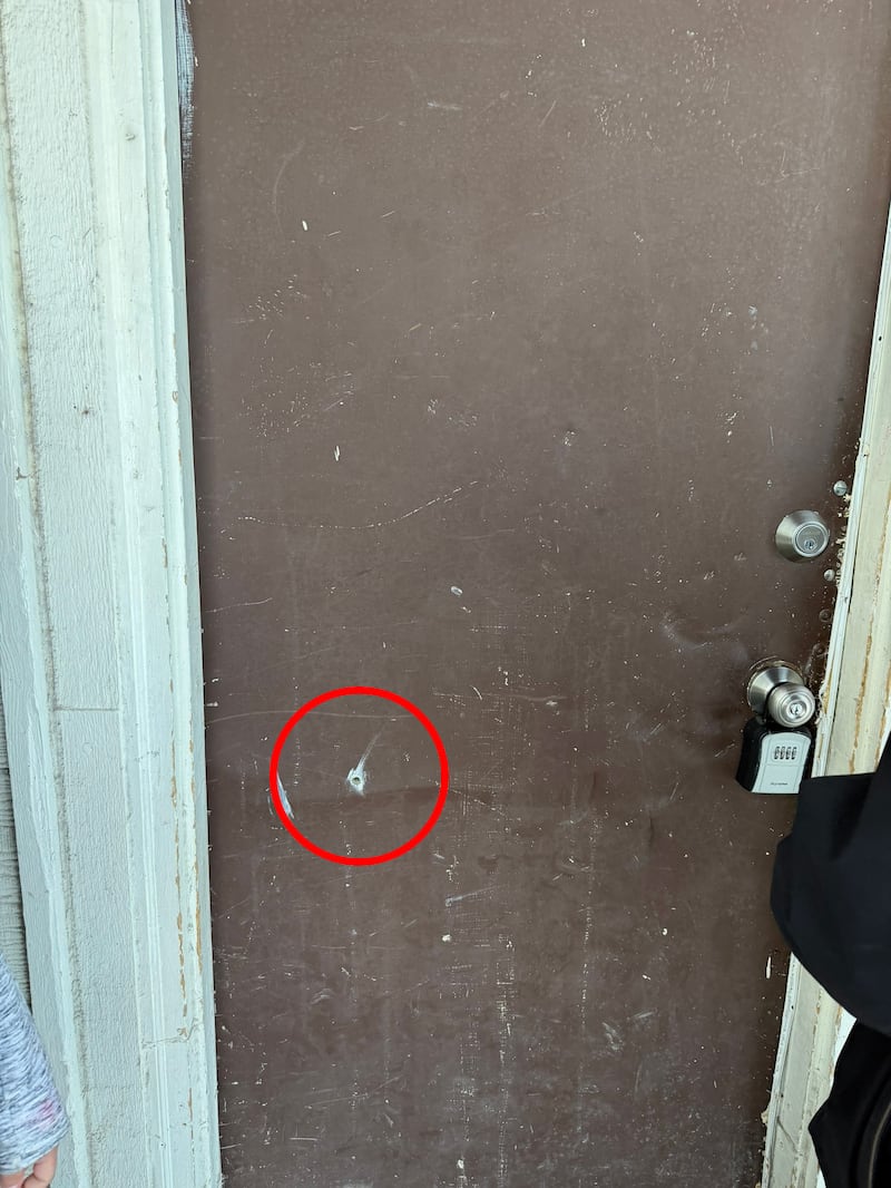 Bullet hole in door