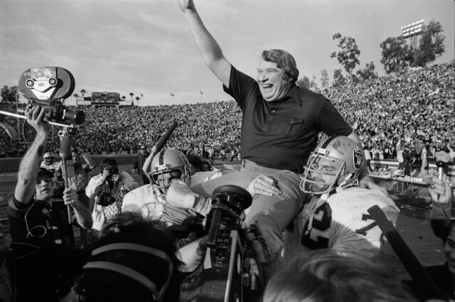 Oakland Raiders head coach John Madden is hoisted off the field after Super Bowl XI victory over Minnesota Vikings in Rose Bowl Stadium in Pasadena, CA. 