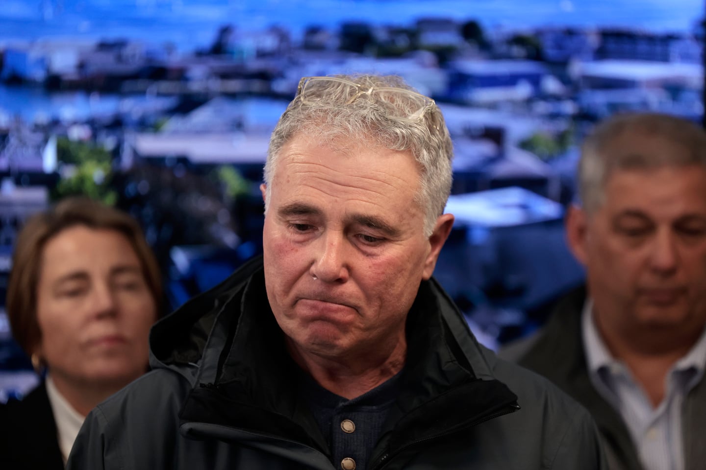 Vito Giacalone was flanked Saturday by Governor Maura Healey and state Senator Bruce Tarr during a press conference in Gloucester.