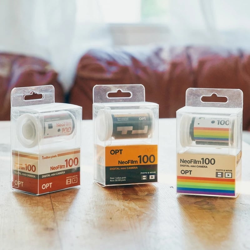 A group of rolls of film on a table.