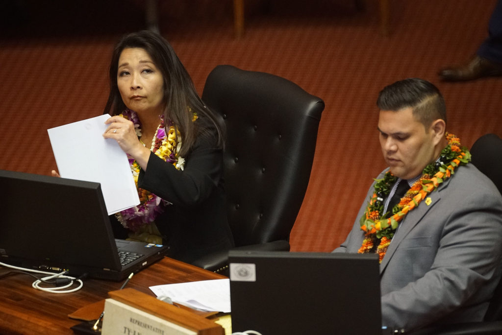 Rep Sylvia Luke and Rep Ty Cullen seated during last day of session.