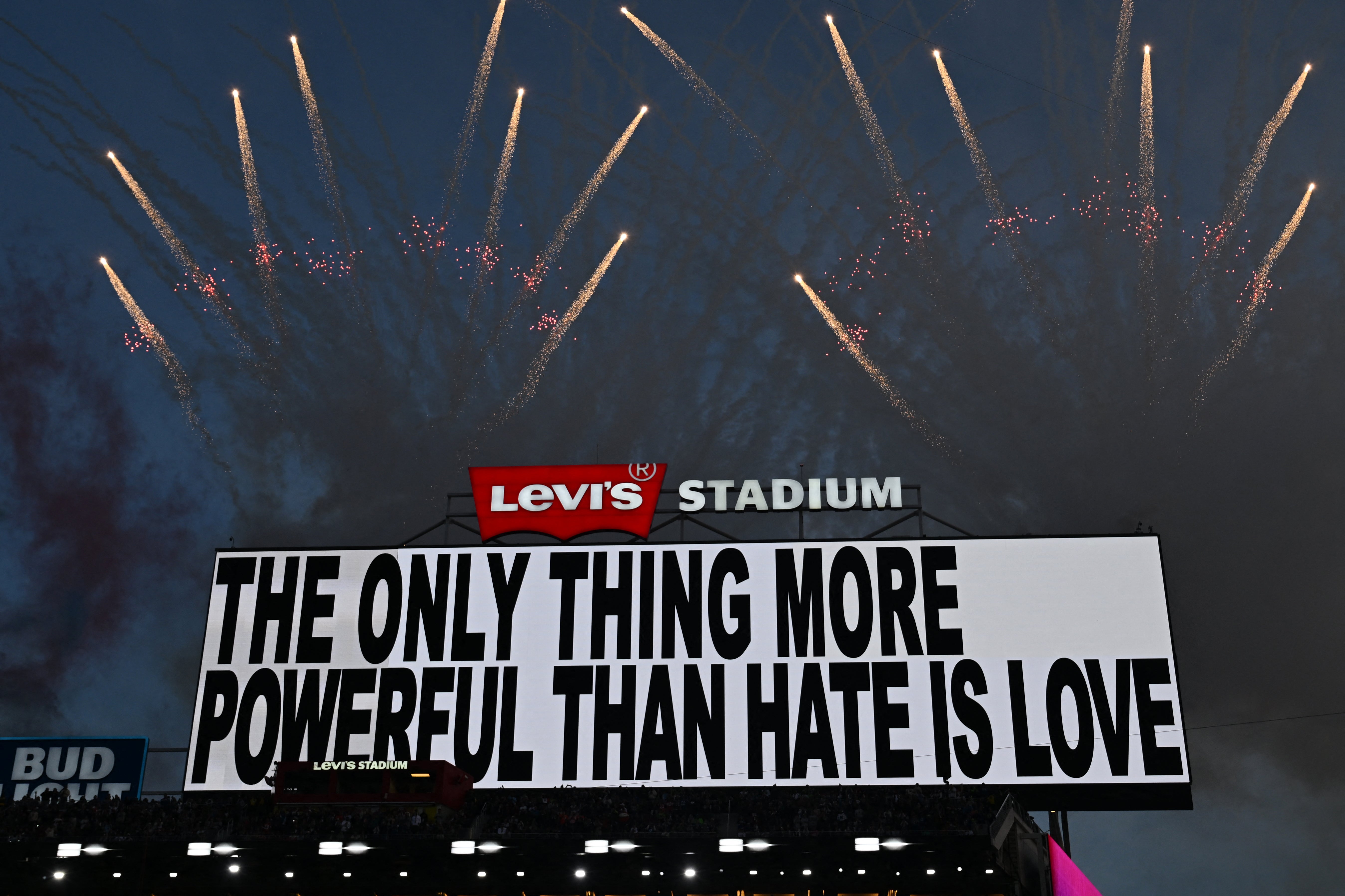 As Bad Bunny performed, a message was displayed on the stadium's scoreboards: 'The only thing more powerful than hate is love'